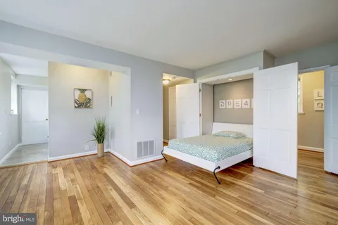 a living room with a rug