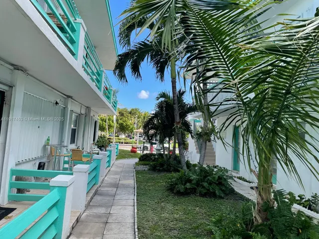 a view of a yard in front of a house