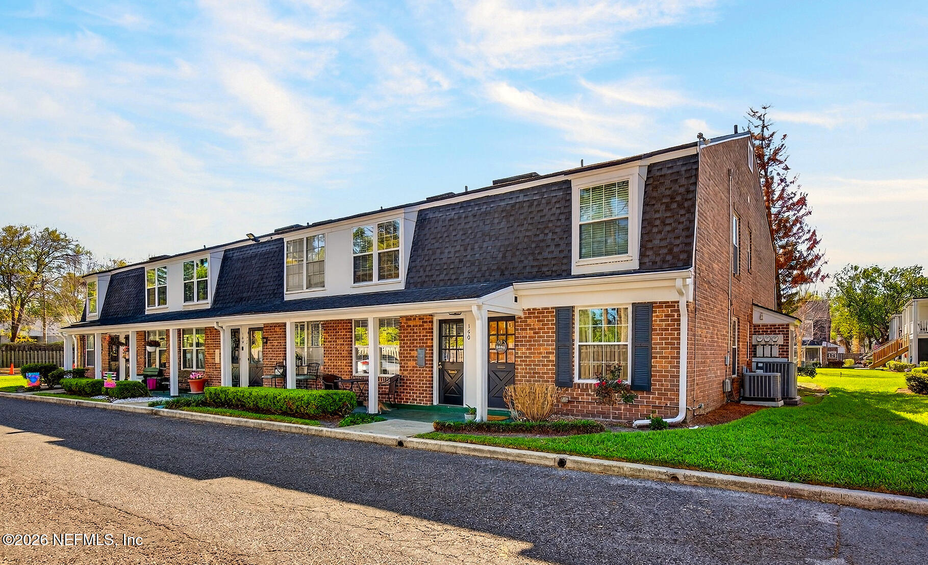 4358 Timuquana Road, Unit 150 Jacksonville, FL 32210 - Photo 1 of 21 a front view of a house with a yard