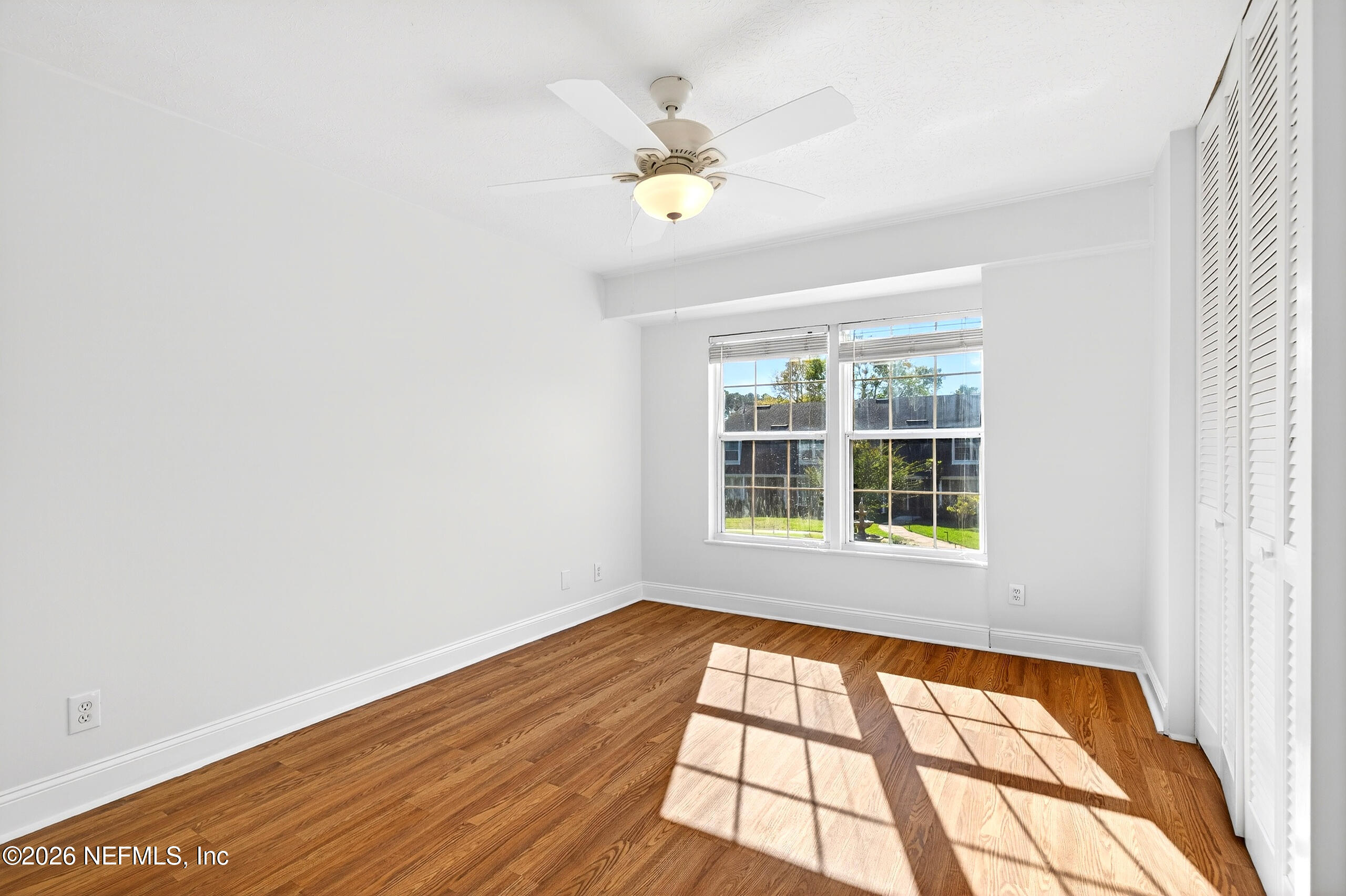 4358 Timuquana Road, Unit 150 Jacksonville, FL 32210 - Photo 13 of 21 a view of an empty room with a window