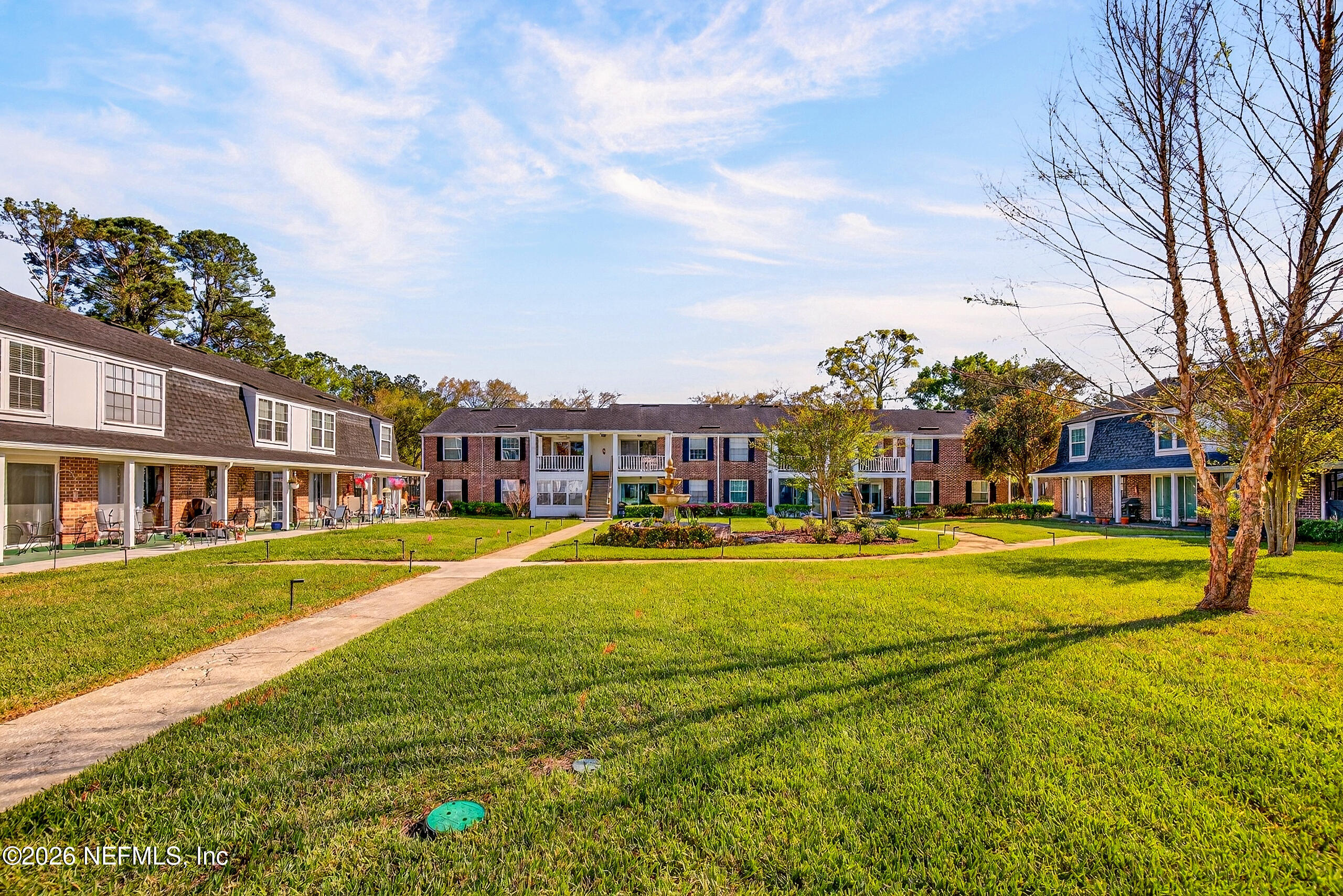 4358 Timuquana Road, Unit 150 Jacksonville, FL 32210 - Photo 17 of 21 a swimming pool view with a garden and plants