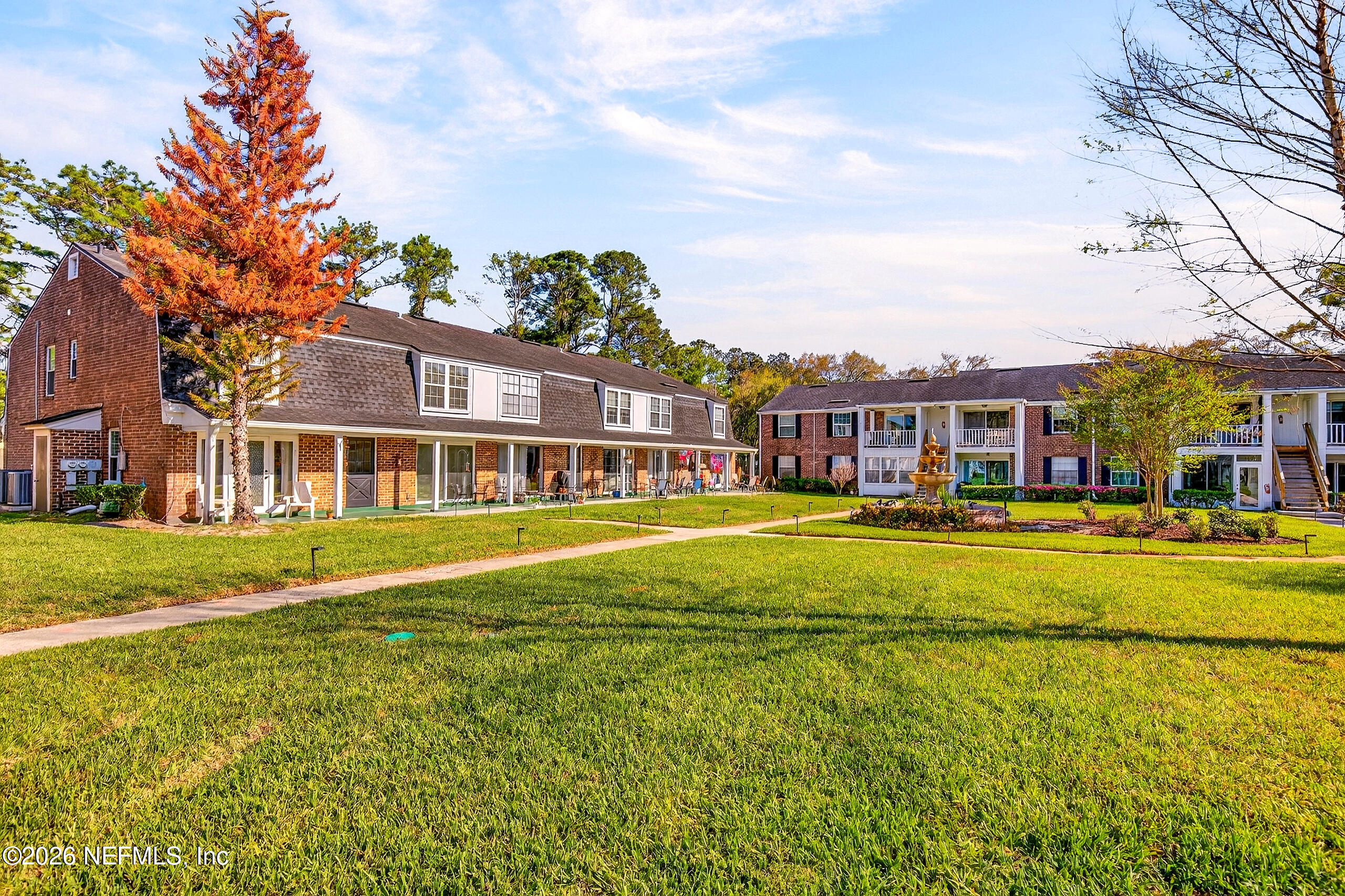 4358 Timuquana Road, Unit 150 Jacksonville, FL 32210 - Photo 18 of 21 a front view of a house with swimming pool having outdoor seating