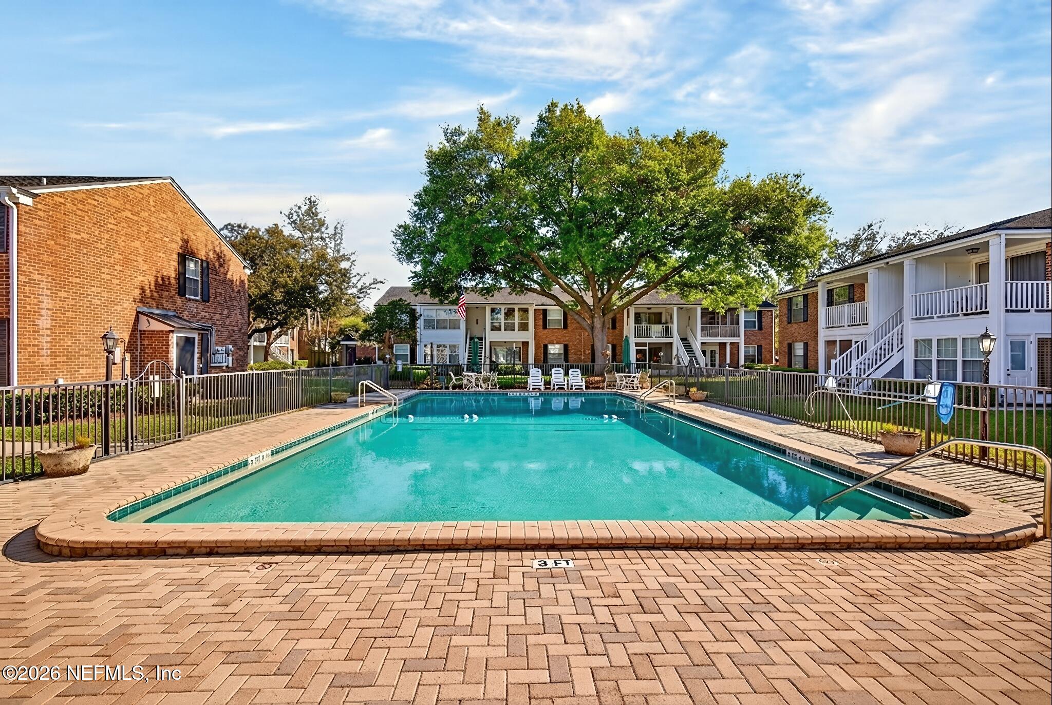 4358 Timuquana Road, Unit 150 Jacksonville, FL 32210 - Photo 19 of 21 a view of a house with pool