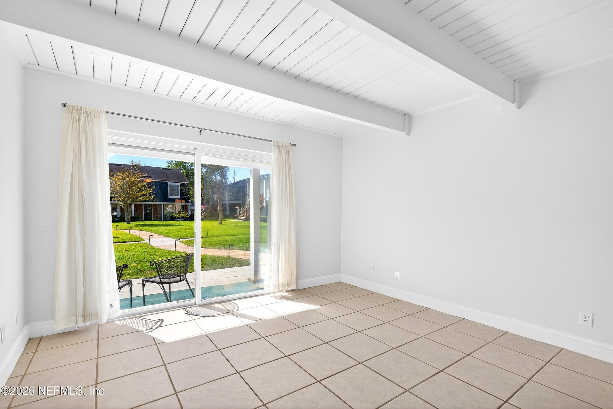 4358 Timuquana Road, Unit 150 Jacksonville, FL 32210 - Photo 7 of 21 a view of an empty room and window