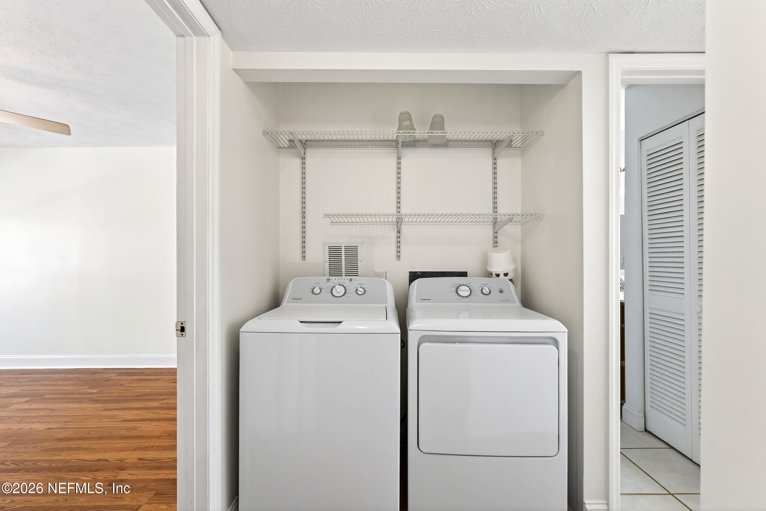 4358 Timuquana Road, Unit 150 Jacksonville, FL 32210 - Photo 9 of 21 a utility room with dryer and washer