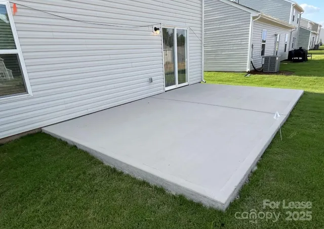 a view of a backyard with a garden