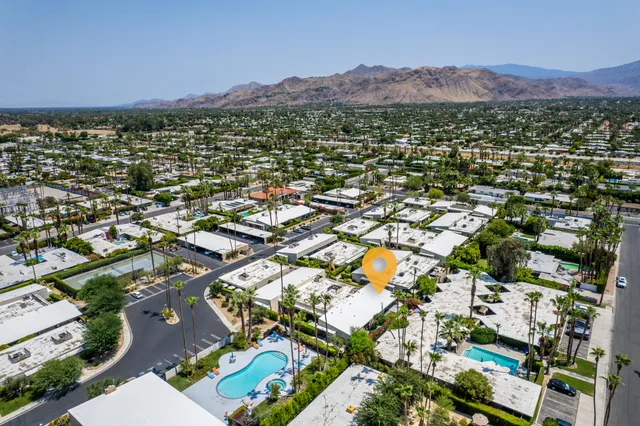 an aerial view of residential house with outdoor space