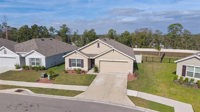 front view of a house with a yard