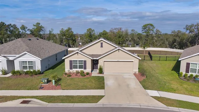 front view of house with a yard