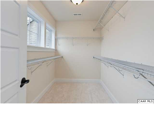 5309 Raven Stone Road Crozet, VA 22932 - Photo 22 of 38 a bathroom with a sink and a shower