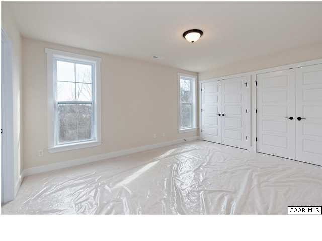 5309 Raven Stone Road Crozet, VA 22932 - Photo 28 of 38 a room with a bed and a window