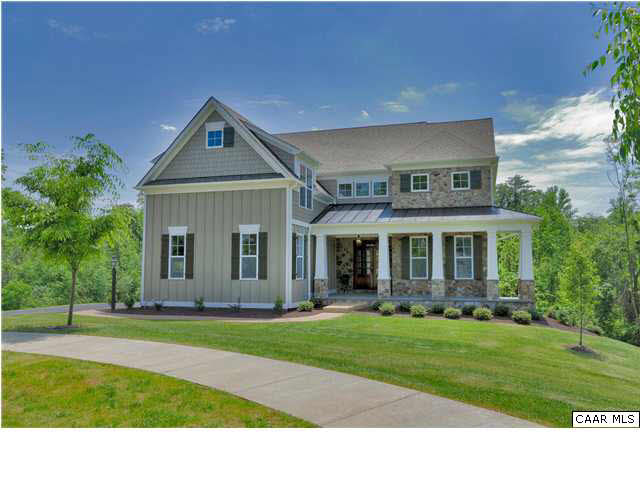 5309 Raven Stone Road Crozet, VA 22932 - Photo 37 of 38 a front view of a house with a yard and trees