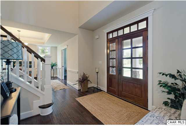 5309 Raven Stone Road Crozet, VA 22932 - Photo 5 of 38 a living room with furniture potted plant and a window