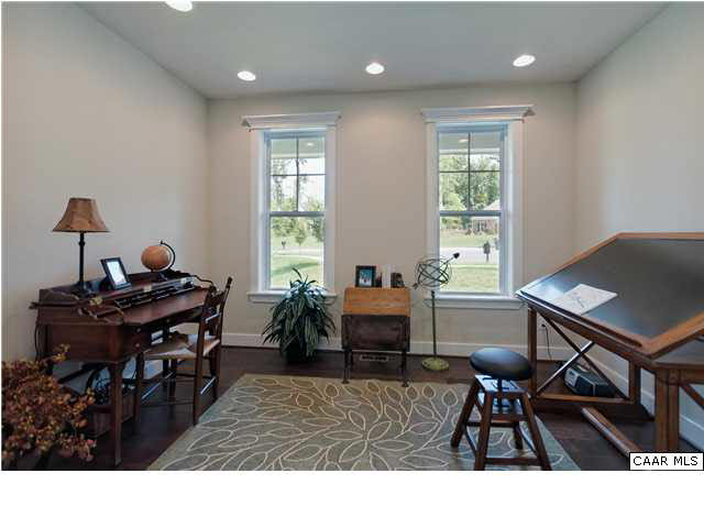 5309 Raven Stone Road Crozet, VA 22932 - Photo 6 of 38 a living room with furniture a window and a piano