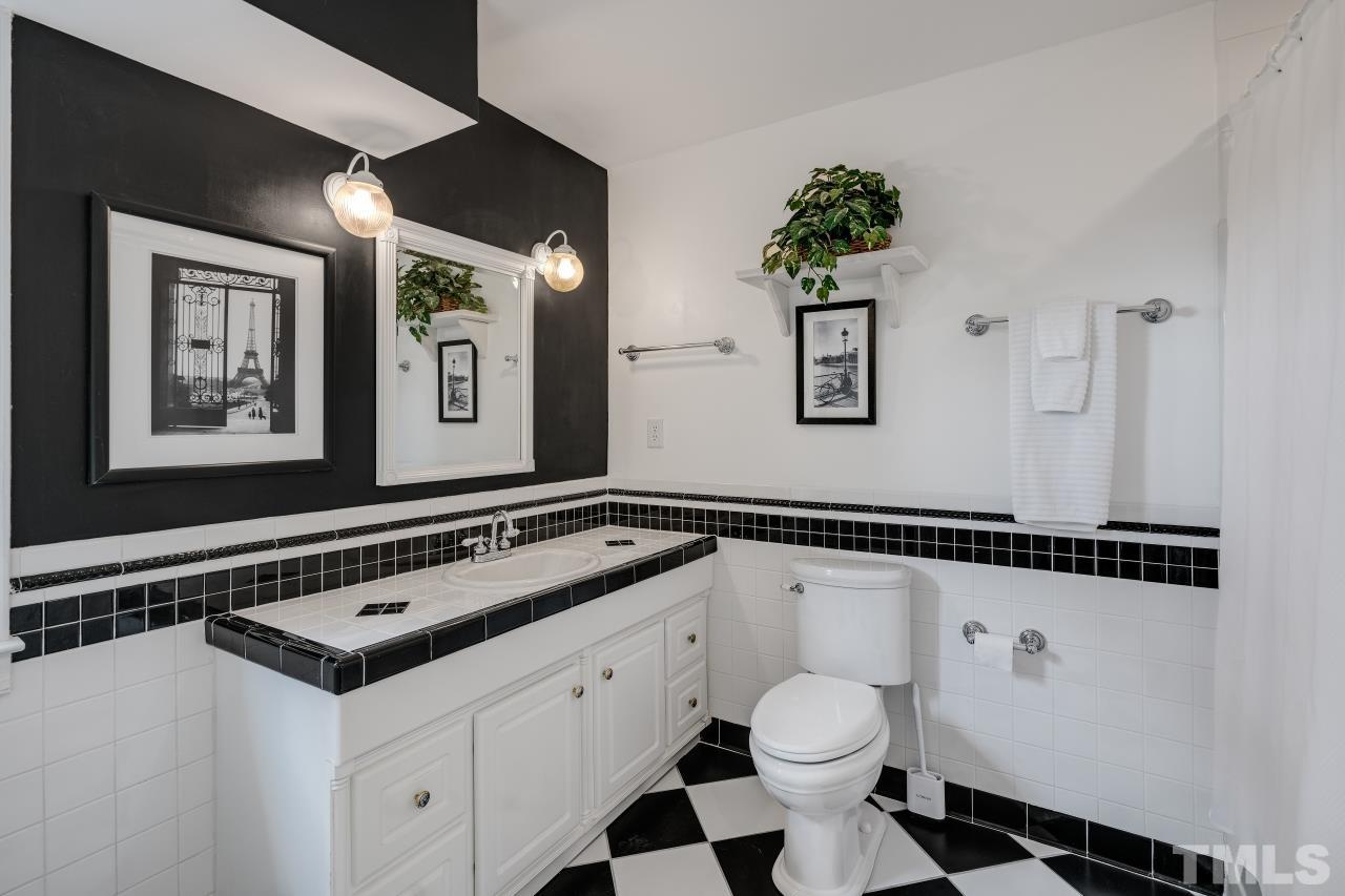 4108 Pleasant Grove Church Road Raleigh, NC 27613 - Photo 12 of 30 a view of a hallway with washer and dryer