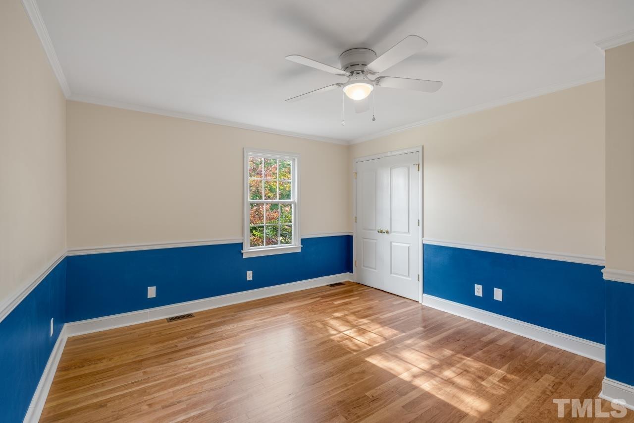 4108 Pleasant Grove Church Road Raleigh, NC 27613 - Photo 20 of 30 an empty room with windows and closet