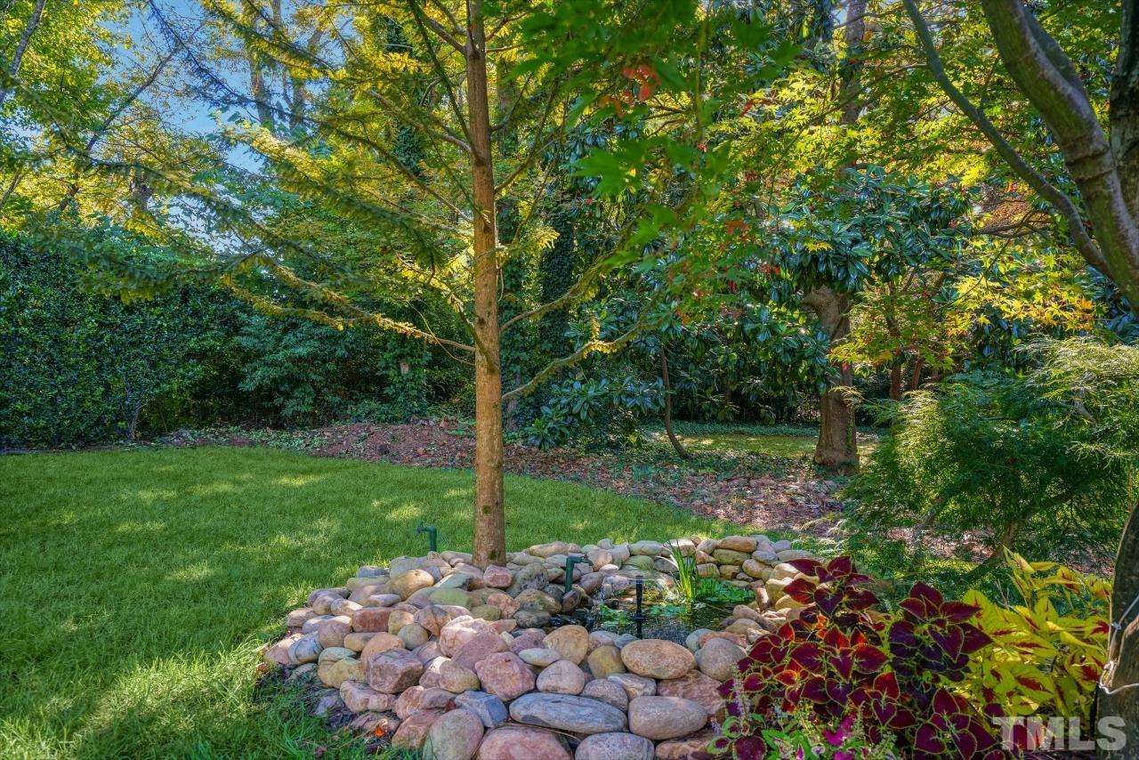 4108 Pleasant Grove Church Road Raleigh, NC 27613 - Photo 24 of 30 a view of a backyard with garden