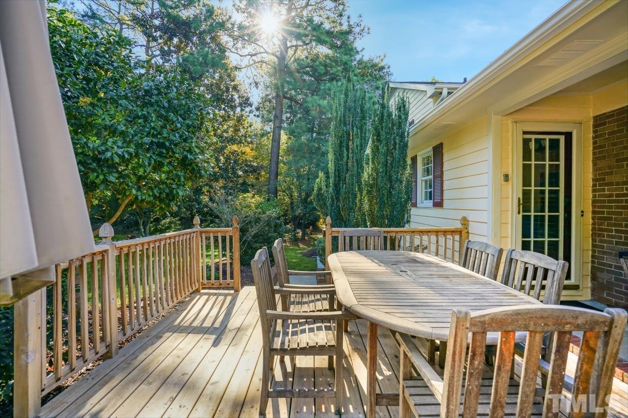4108 Pleasant Grove Church Road Raleigh, NC 27613 - Photo 25 of 30 a view of a deck with furniture and wooden deck