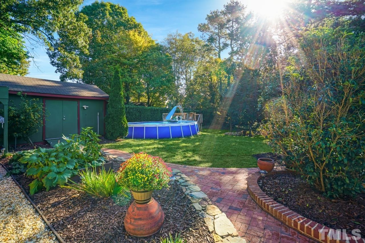 4108 Pleasant Grove Church Road Raleigh, NC 27613 - Photo 28 of 30 a front view of a house with a yard