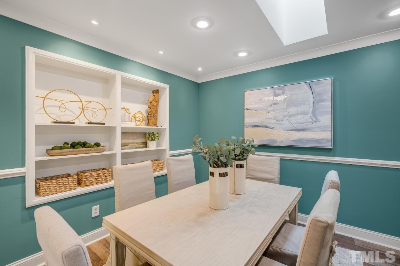 4108 Pleasant Grove Church Road Raleigh, NC 27613 - Photo 5 of 30 a dining room with furniture and wooden floor