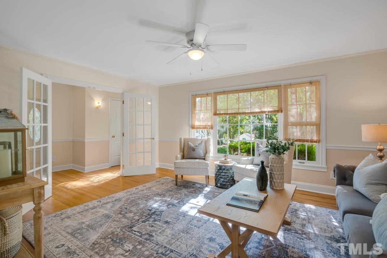 4108 Pleasant Grove Church Road Raleigh, NC 27613 - Photo 7 of 30 a living room with furniture and a large window