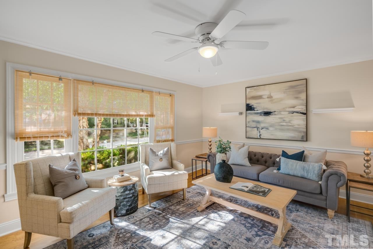 4108 Pleasant Grove Church Road Raleigh, NC 27613 - Photo 8 of 30 a living room with furniture and a large window