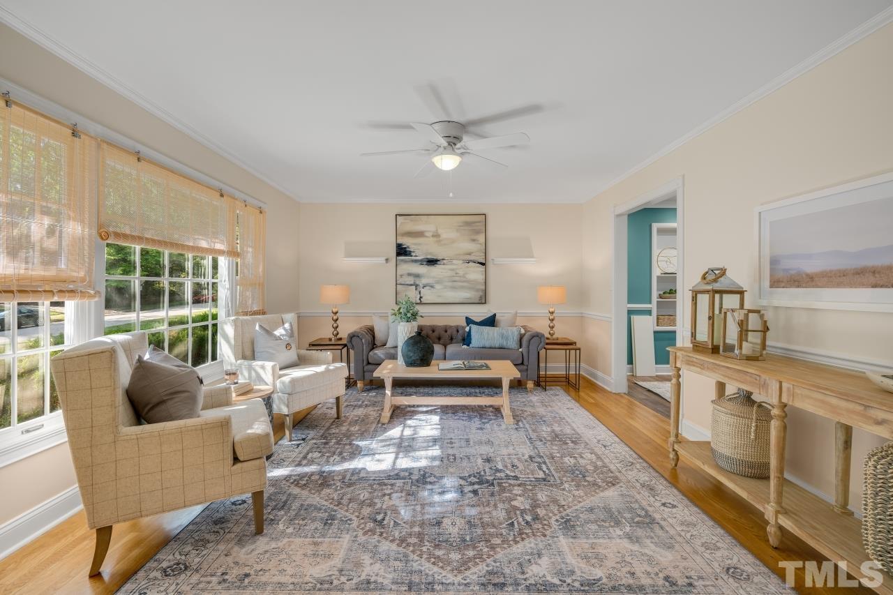 4108 Pleasant Grove Church Road Raleigh, NC 27613 - Photo 9 of 30 a living room with furniture and a large window