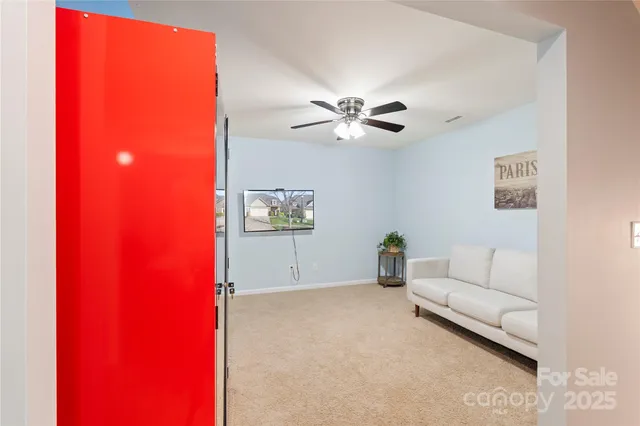 a view of workspace with a window and cabinet