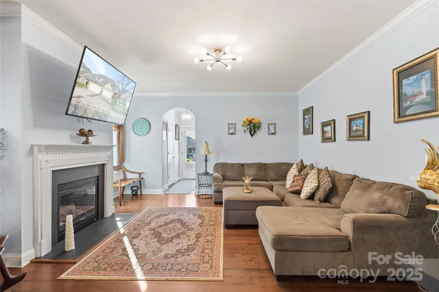 a view of a dining room with furniture and window
