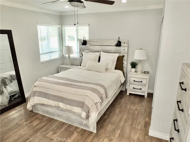 a bed room with a bed and a tv