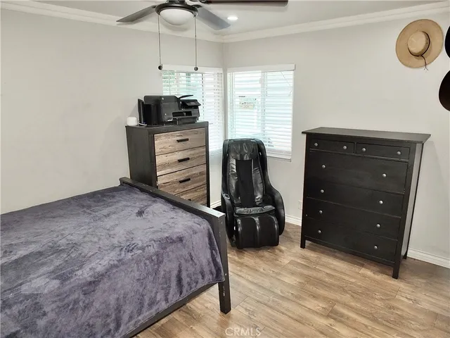 a bedroom with a bed and furniture