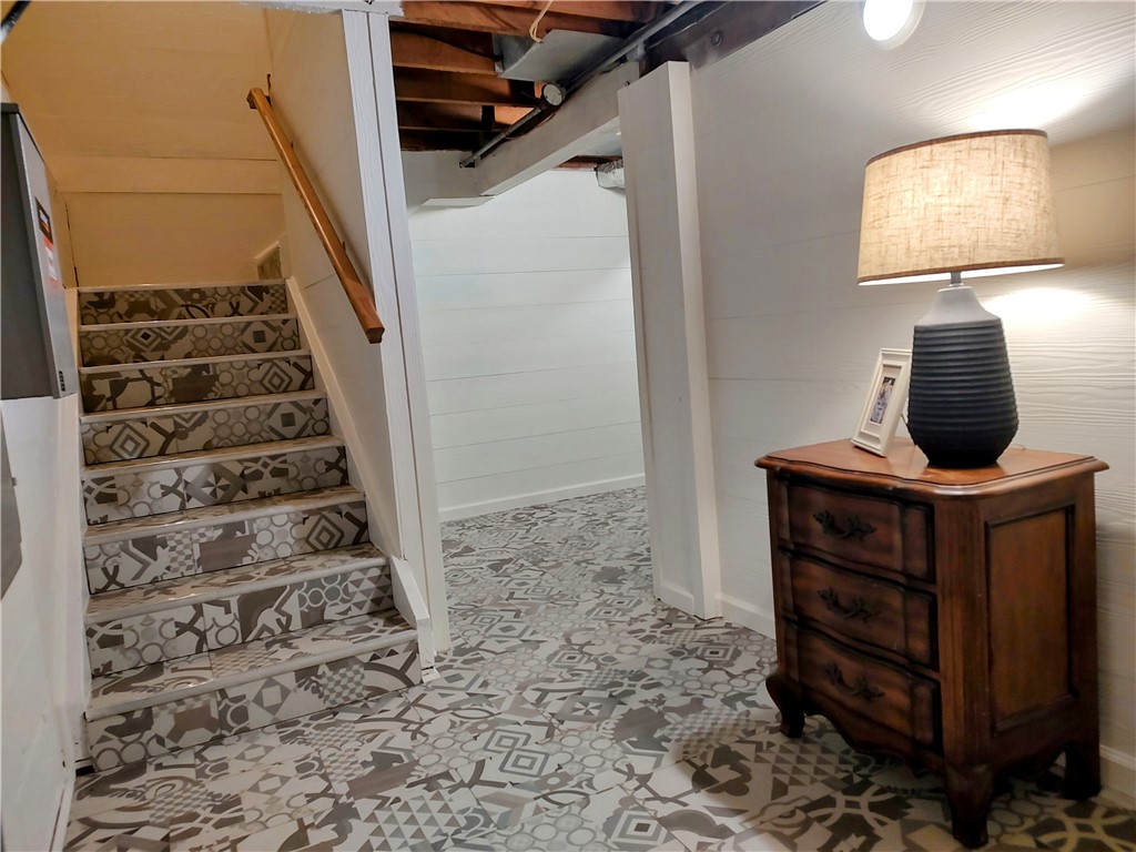 209 Riggs Drive Clemson, SC 29631 - Photo 30 of 32 Designer tile leading to lower level