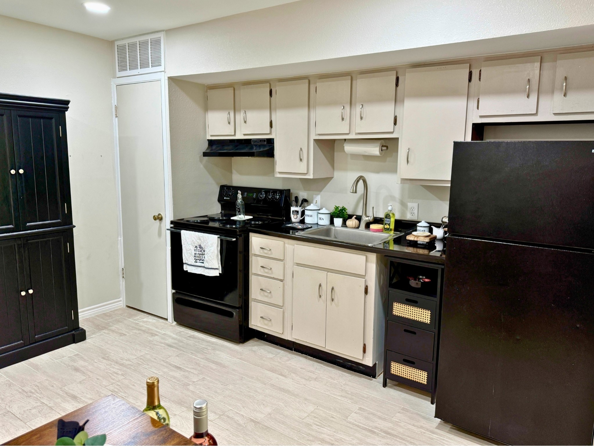 12900 Walden Road, Unit 505 Montgomery, TX 77356 - Photo 16 of 50 a kitchen with stainless steel appliances a refrigerator sink and cabinets