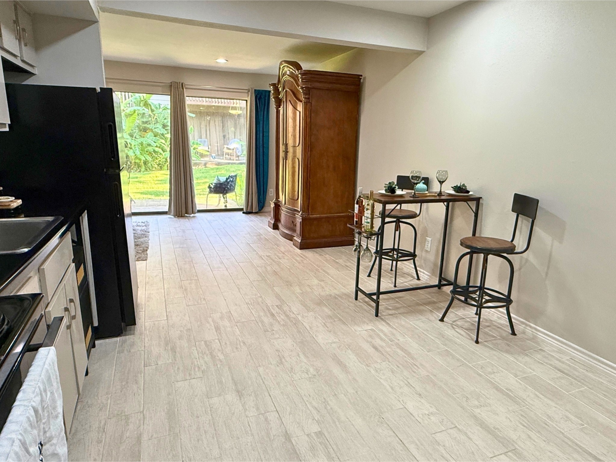 12900 Walden Road, Unit 505 Montgomery, TX 77356 - Photo 26 of 50 a view of a livingroom with furniture window and wooden floor