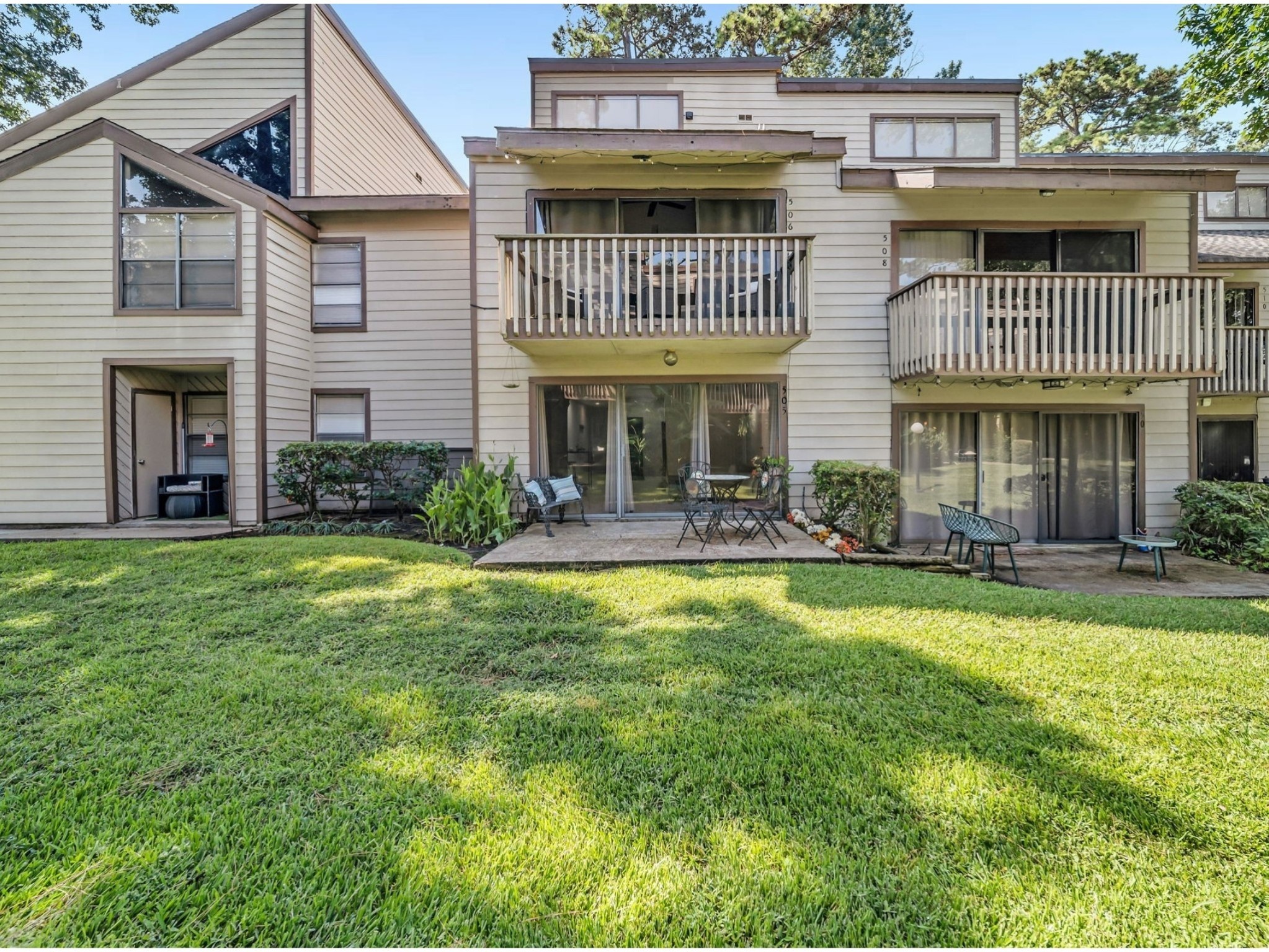 12900 Walden Road, Unit 505 Montgomery, TX 77356 - Photo 29 of 50 a view of a house with a swimming pool