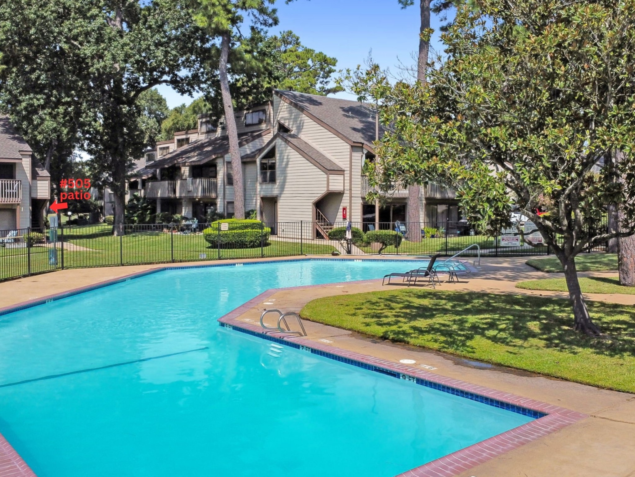 12900 Walden Road, Unit 505 Montgomery, TX 77356 - Photo 30 of 50 a view of a big yard with palm trees