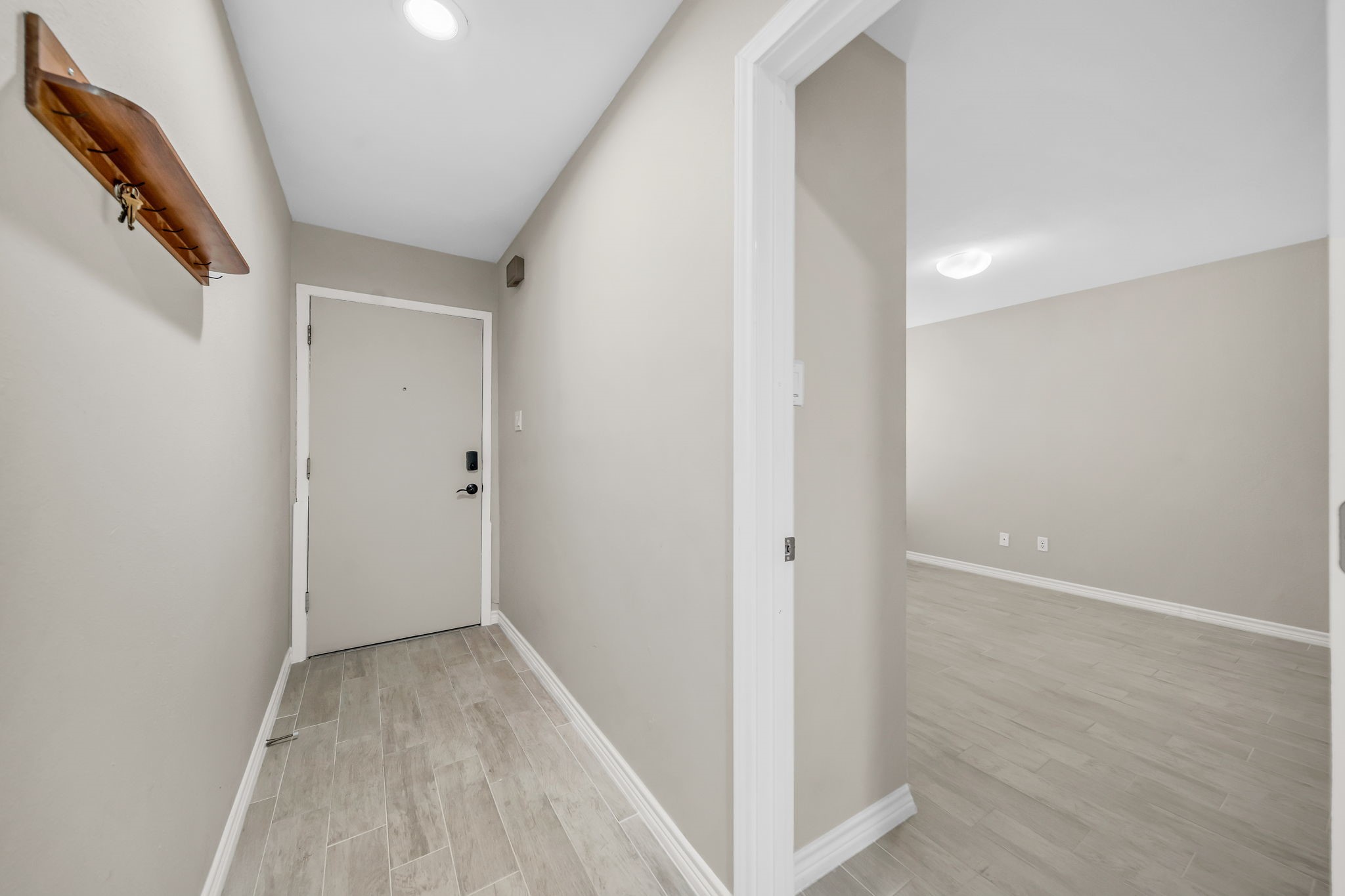 12900 Walden Road, Unit 505 Montgomery, TX 77356 - Photo 4 of 50 a view of hallway with wooden floor