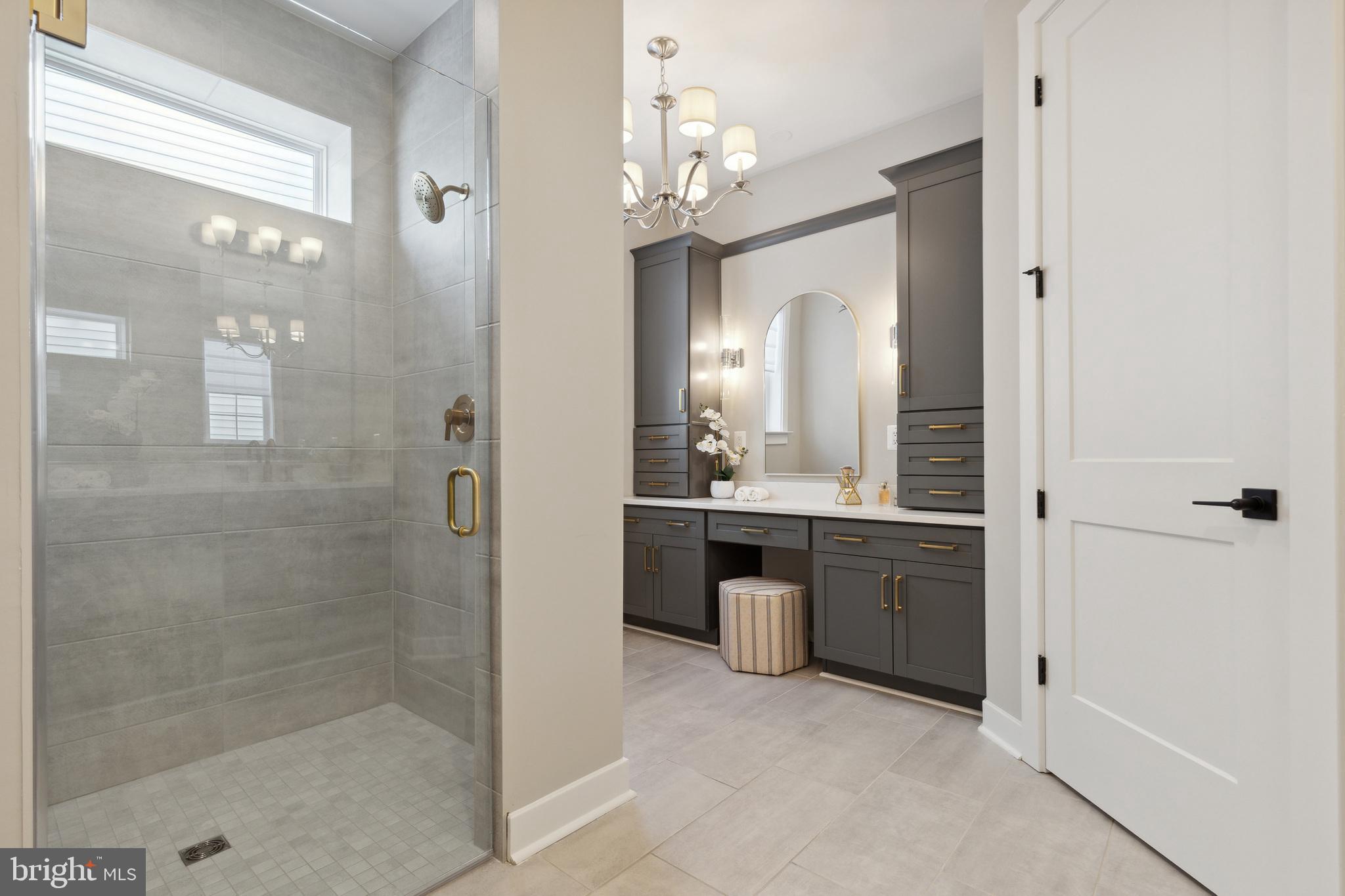 Lot#3 Midhill Road Spring Grove, PA 17362 - Photo 21 of 36 a bathroom with a granite countertop sink a mirror and a shower