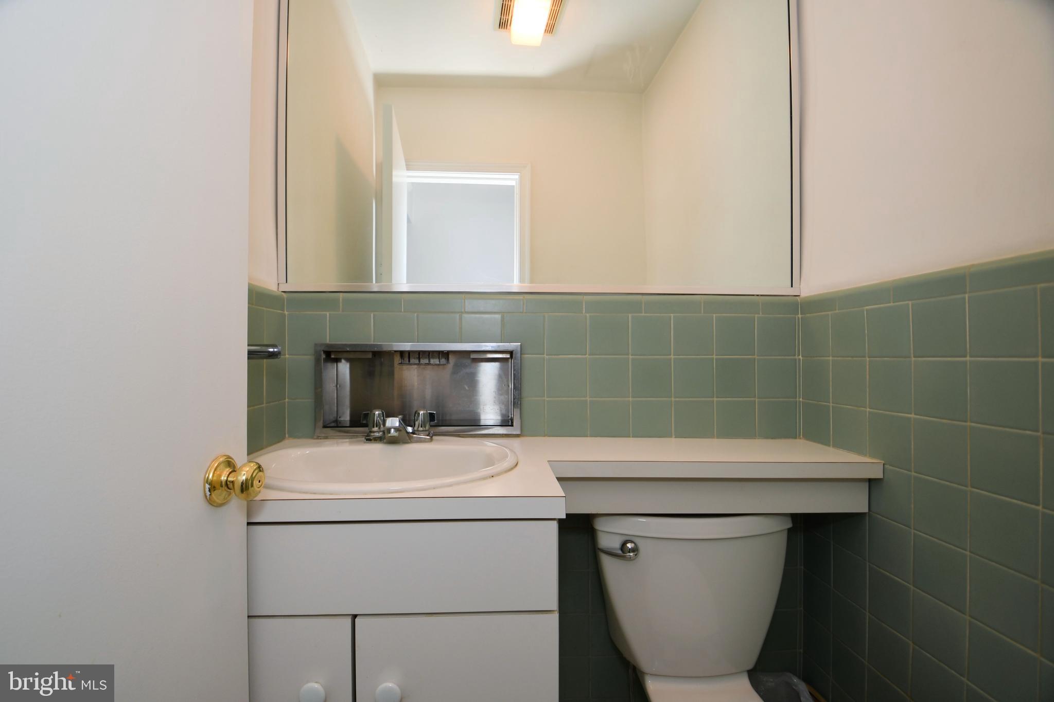 1015 Edann Road Oreland, PA 19075 - Photo 33 of 46 Half bath