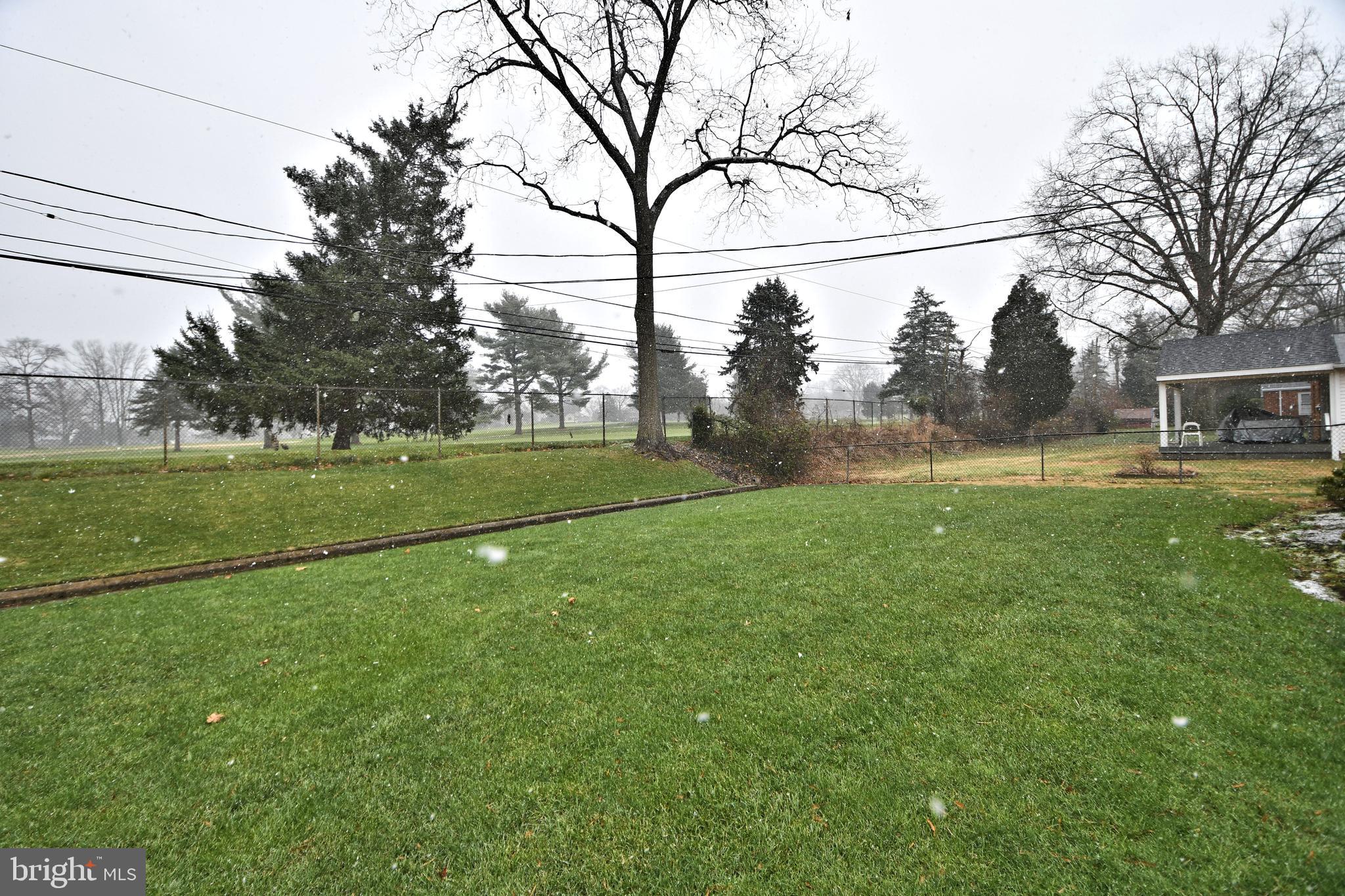 1015 Edann Road Oreland, PA 19075 - Photo 42 of 46 backyard looking at golf course