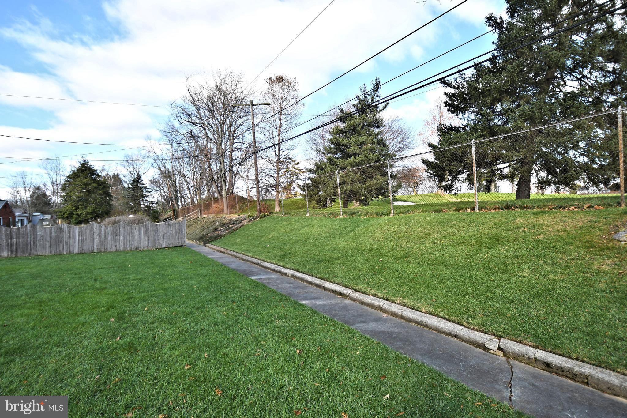 1015 Edann Road Oreland, PA 19075 - Photo 45 of 46 backyard backing up to golf course