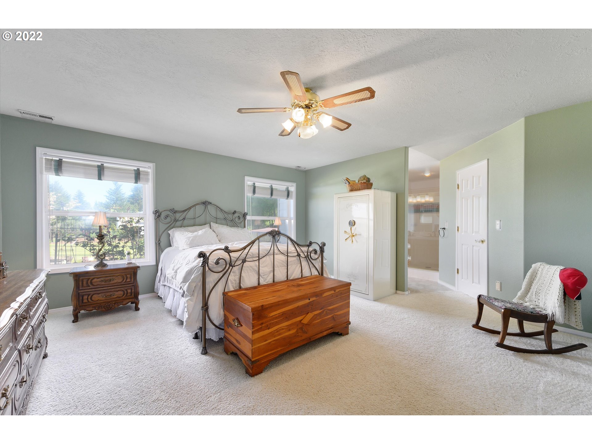 16750 Oakdale Road Dallas, OR 97338 - Photo 15 of 32 a bedroom with furniture and a large window