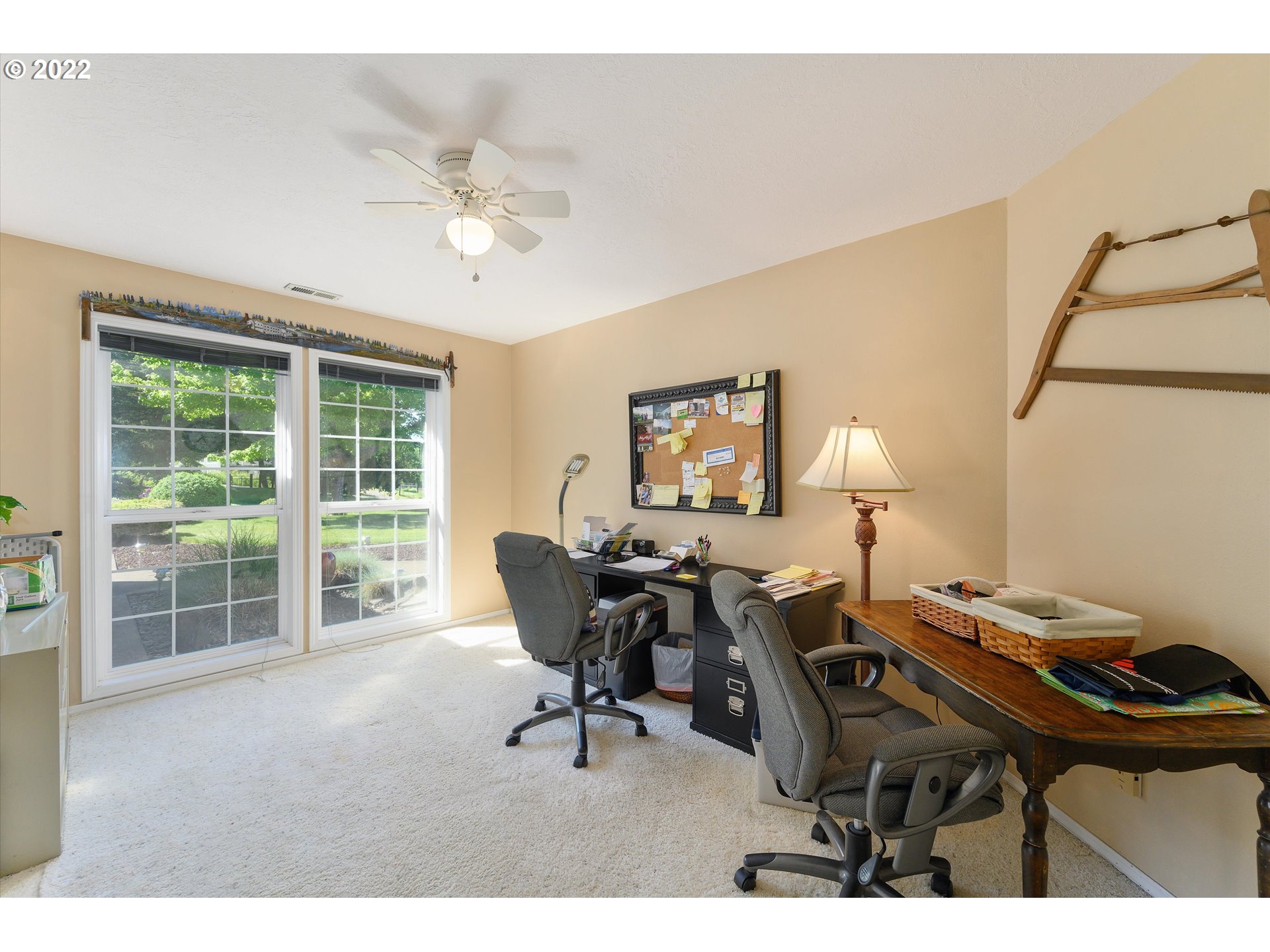 16750 Oakdale Road Dallas, OR 97338 - Photo 18 of 32 a workspace with furniture and a chandelier