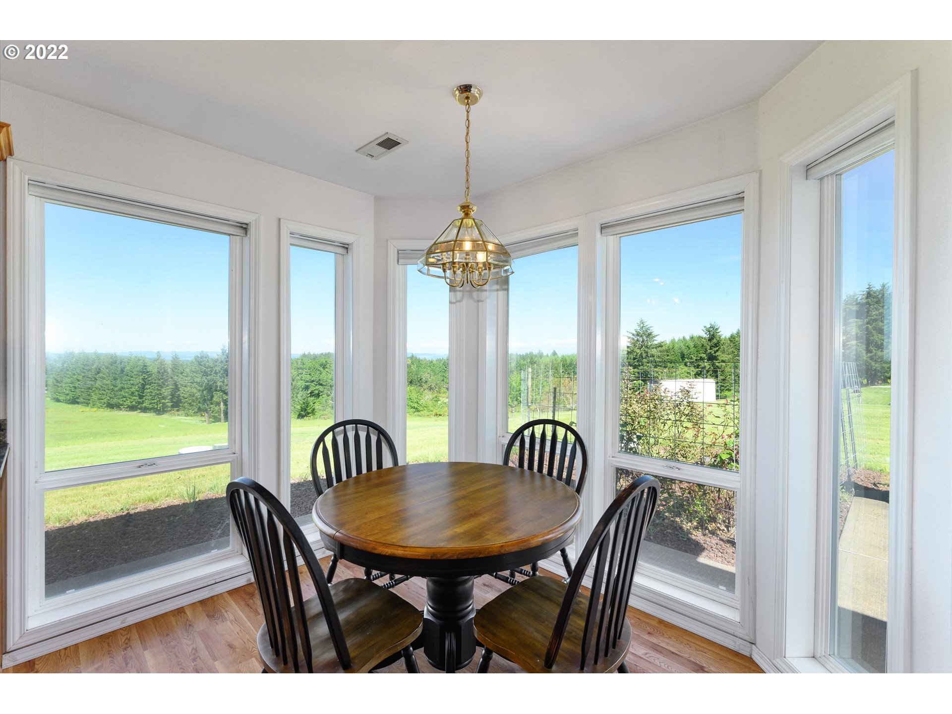 16750 Oakdale Road Dallas, OR 97338 - Photo 10 of 32 a view of a room with a table and chairs