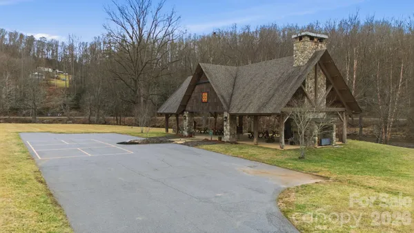 a view of a house with swimming pool