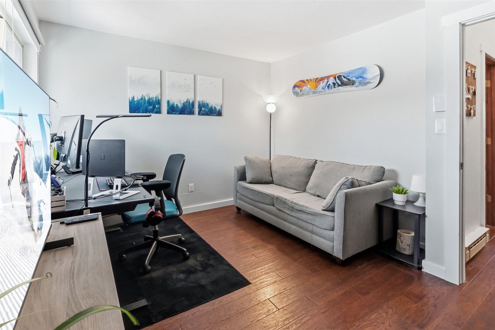 6920 Ryan Gulch Road, Unit 6920 Silverthorne, CO 80498 - Photo 31 of 48 a living room with furniture and a wooden floor