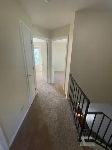 a view of a room with staircase