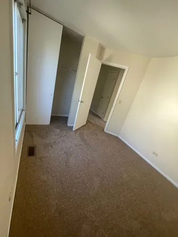 an empty room with door