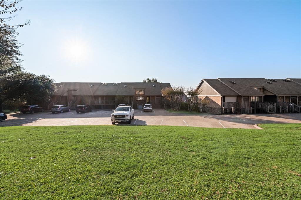 1031 Signal Ridge Place, Unit 1031 Rockwall, TX 75032 - Photo 17 of 20 a view of a house with pool and sitting area