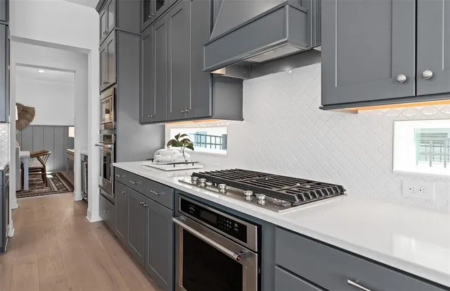 a dining room with large window